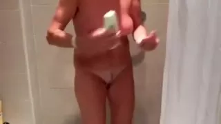 My wench wife taking a shower and toying her cum-hole