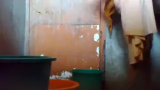 Bangladeshi Maid taking shower.