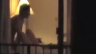 Window Voyeur: Pair having sex