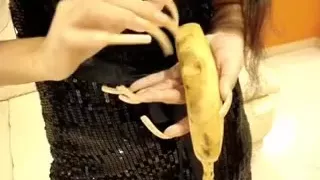 long natural nails slice a banana