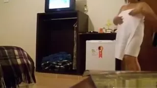 Cute chubby amateur slut is showing her beautiful body in this clip. She just got out of the shower, exposing her large bosom.