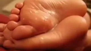 This nasty amateur cumshot video shows me jerking my wang over my hon's feet and cumming all over them.