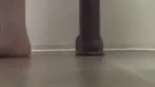 Big dildo suction cupped to the floor