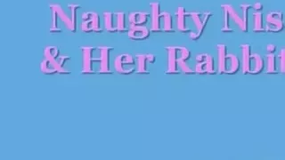 Nis cumming with her rabbit