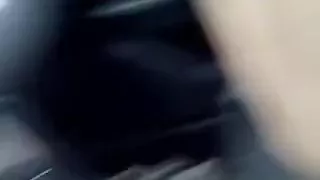 Wife occupying herself on a road voyage