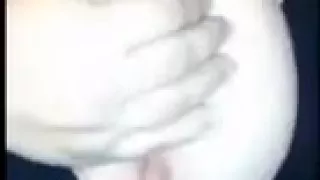 Wife playing with her dolphin