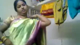 Tamil woman stripping to disclose her breast