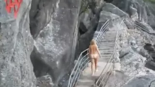 walking undressed on the stairways outside