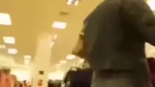 woman changing bras in a dressing room blows her ally