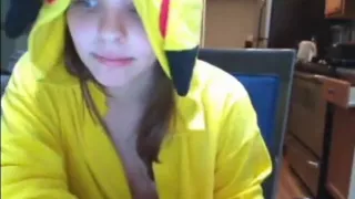 Cute dark brown rubs a massager on her love button