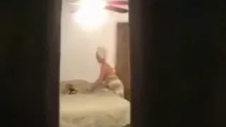 Spying on woman masturbating with sex tool