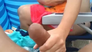Wife jerking me off at the beach. please comment