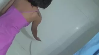 Breasty oriental plays in shower with toy