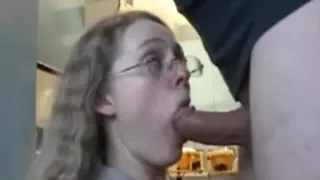 Nerdy honey sucks and copulates in the kitchen