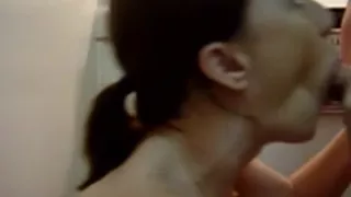 Side view of a slobbering soaked oral-stimulation and facial