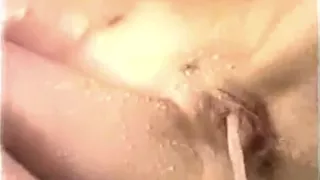 Kinky pussy play in the bathtub