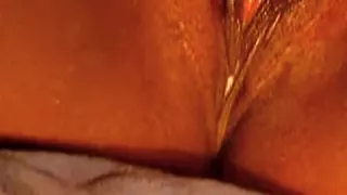 Rubbing my hot and wet ebony clit