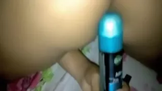 Lascivious Latin Babe stuffs herself with a deodorant glass