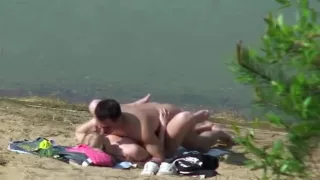 Spying on a wild pair fucking by the lake