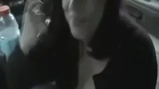 Busty gal sucks me off in the car