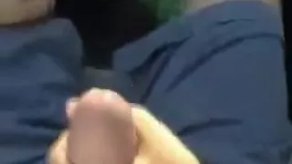 Giving a handjob in a moving car