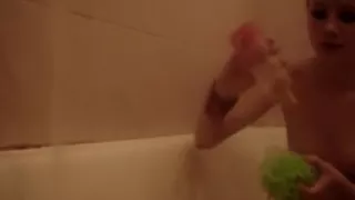 Cute barely legal babe taking a washroom