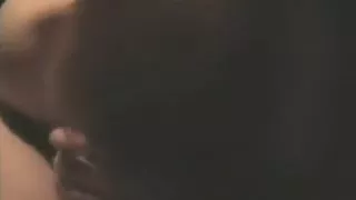 Sucking on a dong in the bedroom