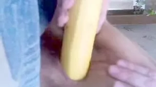 Rubbing my cunt with a sweet banana