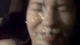 Asian babe gets facialized