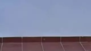 flashing her bawdy cleft andwatering the balcony in spain