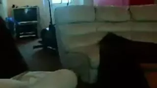 older wife clothed up with red satin and red nylons widens her legs and inserts a toy