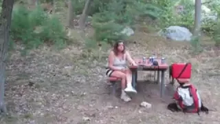 this babe is flashing her milk cans and unshaved wet crack at the campground