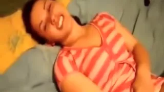 legal age teenager teases her boyfriend  by masturbating with a sex toy on her sofa