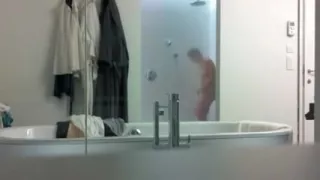 Bathing woman captured on voyeur cam