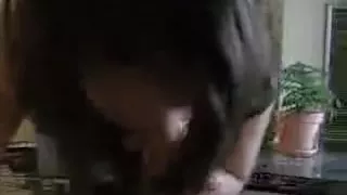 Admirable looking dark brown hair cutie giving head