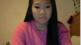 Asian slut masturbates on webcam