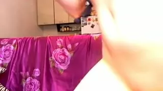 Ugly slut masturbates on a webcam