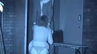 Couple engaging in congress outside, in Japan