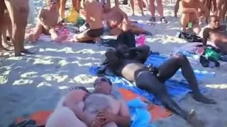 Swingers recorded by voyeur beach sex