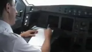 french stewardess exposes her big tits in the cockpit