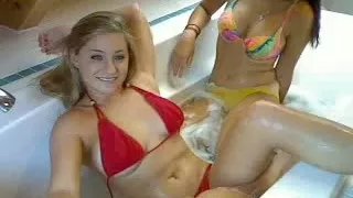 Girlfriends bathe together naked