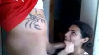 Latina slut gives a blowjob to her friend