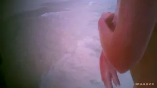 Wife on the public beach