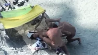 Pair lascivious on the beach caught fucking in 3some on hidden voyeur camera