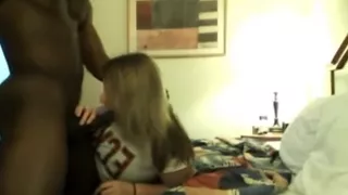 Chubby golden-haired college beauty sucks a black boy-friend