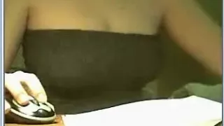 Agreeable beauty pleases herself with a conical sex toy