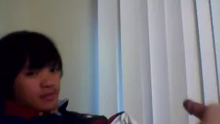 Hot Asian boy rubs his cock on bed