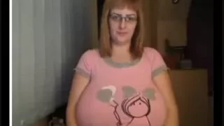 Huge tits and a toy in the twat