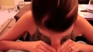 Attractive wife blows her man