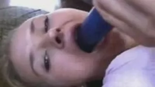 Blue dildo in wet holes